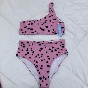 Women’s two piece swimsuit. Pink with black dots. Size Small
